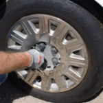 removing wheel cover to get to lug nuts