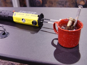 red camping mug used to demonstrate mini-ductor products